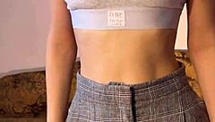 Petite teen 18+ reaches orgasm with dildo in tight pussy striptease solo session.