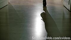 Lady in red latex dominates with strapon play