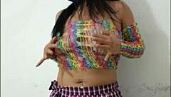 Beautiful woman inserts pink dildo into wet pussy in softcore solo scene.