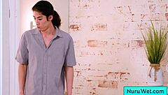 Sexy blonde masseuse with pigtails performs wet nuru massage