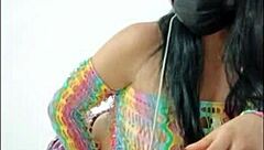 Beautiful woman inserts pink dildo into wet pussy in softcore solo scene.