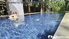 hot babe swims and teases cock poolside