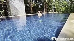 Amateur couple has hot poolside sex with a kinky striptease