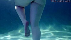 Sensual blonde gets blowjob underwater in hot scene