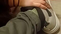 my friend is having fun stepping on and trashing my sneakers with her feet