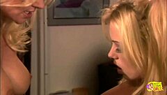 Her lesbian lover stuffs her tight cunt with a long dildo to make her cum