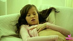 Lynn strips naked and rams a glass dildo deep in her dripping cunt, wow!