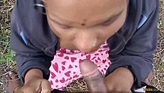 Horny Indian housewife gets wild in jungle blowjob scene