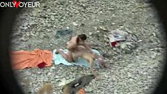 Beautiful woman showing her ass on the beach while being fucked