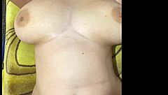 Is This Petite Pregnant Babe Teasing Her Fan on Cam with Close-Up Pussy Shots?