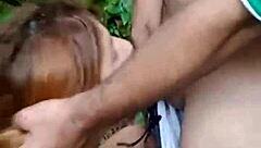 Teasing blowjob on big cock in the forest leads to cum on tits.