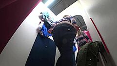 luscious ass in panties caught by hidden camera in public store fitting room.