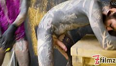 alt dominatrix with tattooed worker in intense session