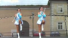 yo, check these two cute majorettes showing off their moves!