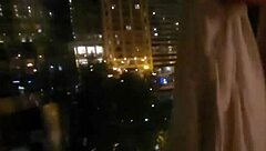 public masturbation tease at hotel window