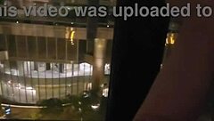 public masturbation tease at hotel window