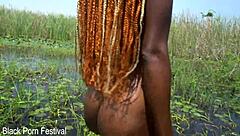 Slim African Woman Bathing In The River With Her Soft Butt Exposed
