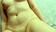 Gorgeous couple enjoys intimate moment.