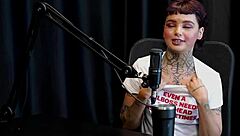 Annie Clementine reveals daring tattoo on red mesh