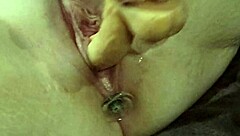 Fisting my ass with a plug while getting fucked