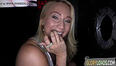 blonde tattooed babe sucks cock hard at gloryhole spot