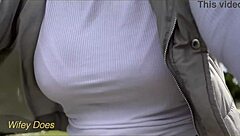 Wifey goes for a public dare bike ride braless with her amazing tits in a tight white shirt. I can't believe she flashed those big boobs!