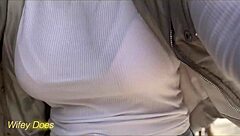 Wifey goes for a public dare bike ride braless with her amazing tits in a tight white shirt. I can't believe she flashed those big boobs!