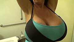 Mrs James Shows Off Huge Fake Tits In Bikini