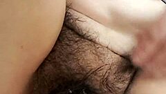 A fat hairy pussy of a hot mature milf revealed while pissing