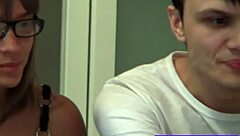 Anna and sam share a casual moment in the college dorm kitchen