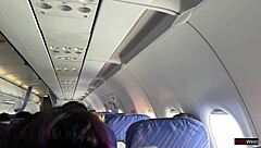 Risky public jerking off on a crowded plane with flashing