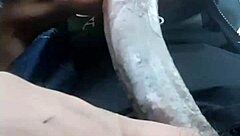 getting the car wet with shampoo in the parking lot during the rain storm with my friends watching