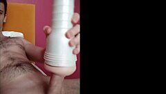 pretty boy uses toy to cum for first time on bed