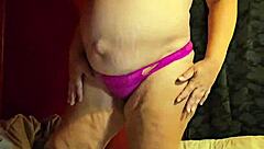 Pregnant wife strips wet in thong.