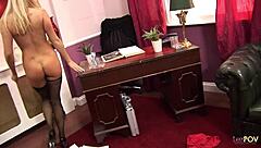 busty brunette catches lesbian boss masturbating, gets strapon lesson