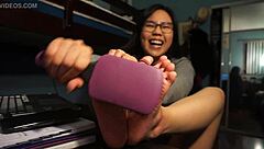 Bound toes are self-tickled in this detailed foot fetish scene with bondage elements