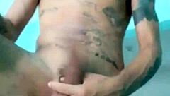 Skinny guy shows off his banana toy in the living room