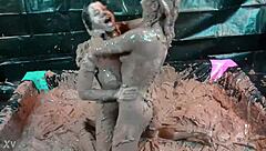 Who wins this glam mud wrestling match?