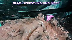 Who wins this glam mud wrestling match?