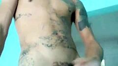 Skinny guy shows off his banana toy in the living room