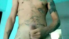 Skinny guy shows off his banana toy in the living room