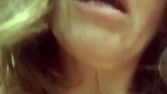 Detailed scene of a woman masturbating to orgasm