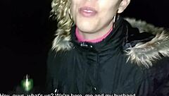 Couple in public behind church