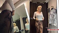 Busty blonde caught trying transparent clothes in dressing room POV!
