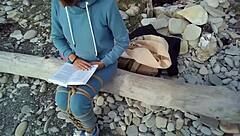 Sofi feels relaxed reading her book by the sea in POV