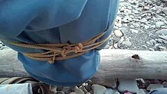 Sofi feels relaxed reading her book by the sea in POV