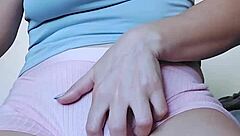 Solo girl fingers her hairy pink pussy until legs shake in orgasm.