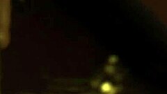 the lovely brunette dances gracefully in the room