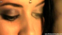 the lovely brunette dances gracefully in the room