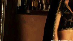 the lovely brunette dances gracefully in the room